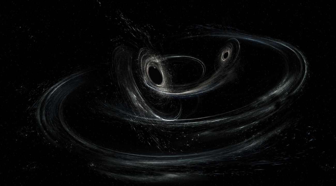 An artist's conception of two black holes orbiting each other. The Laser Interferometer Gravitational-Wave Observatory (LIGO) has captured the gravitational disruption arising from pairs of black holes merging into one.
