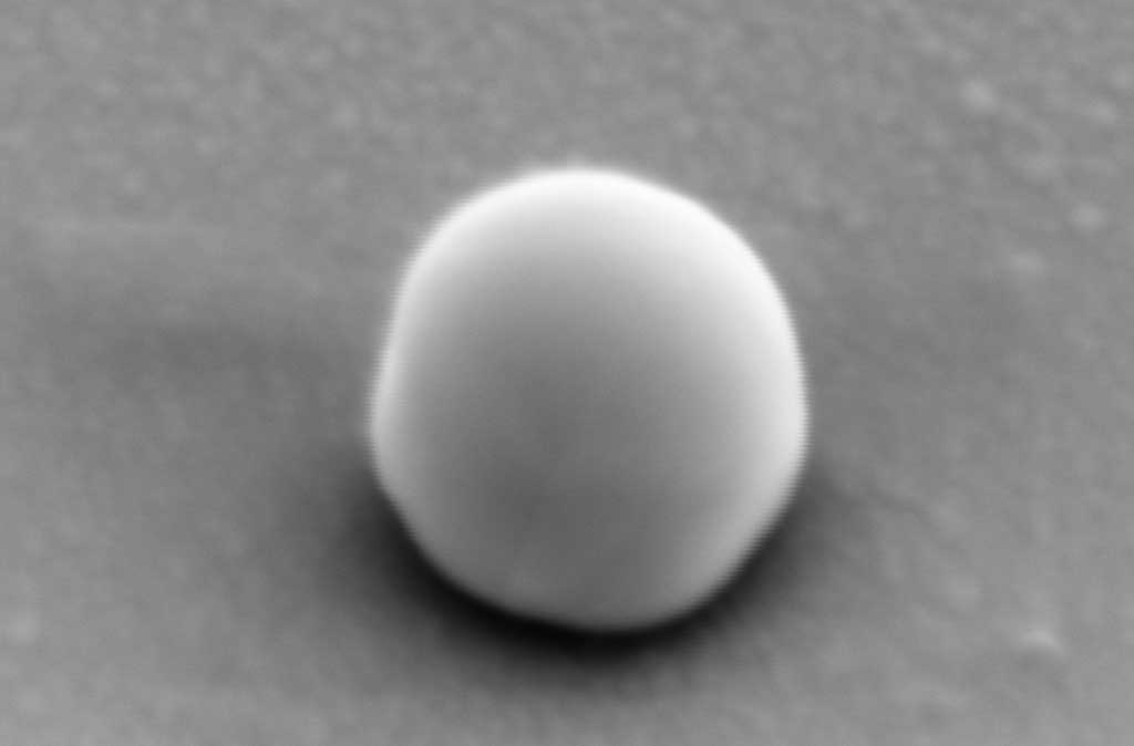 A black and white image of a spheroid setting on a plain background.