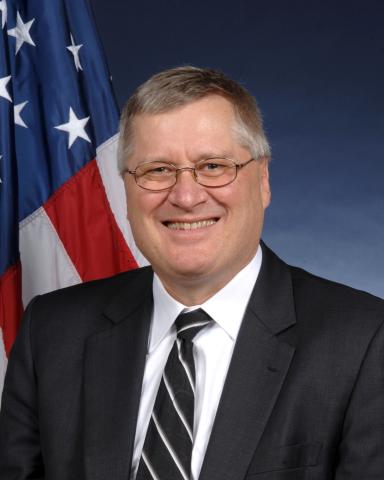 Charles W. Clark, official portrait, National Institute of Standards and Technology. Work of U.S. Government not subject to copyright.